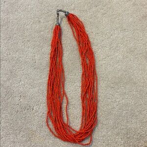 Red orange beaded multistrand necklace